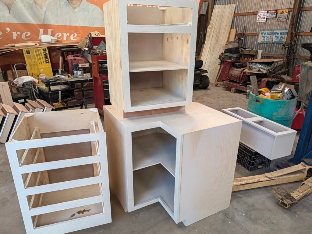Unfinished oak cabinet boxes assembled and ready for paint staging