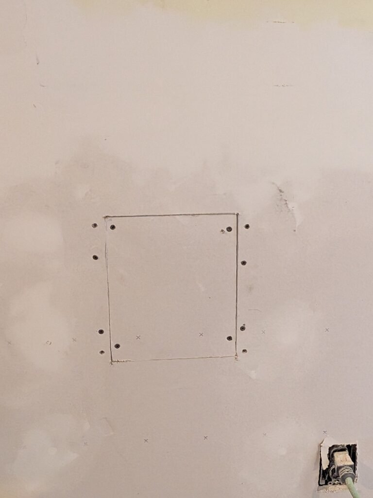 How to patch drywall holes using wood backing cleats and drywall screws