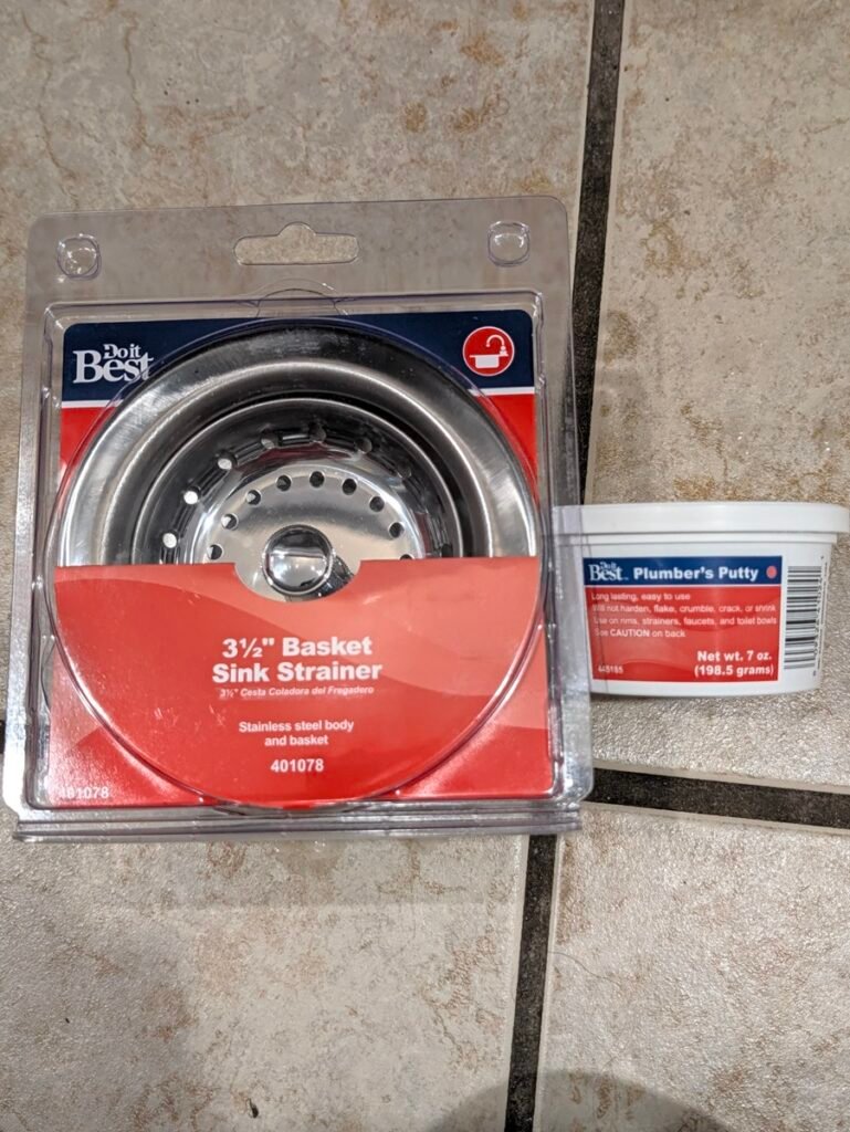 Replacement parts to replace a kitchen sink basket strainer including stainless strainer and plumbers putty